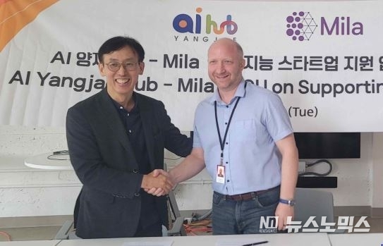지난 6월27일 캐나다 몬트리올시에서 함종민 AI 양재 허브 센터장과 밀라연구소 프레드릭 로랑 밀라 파트너십 시니어 디렉터가 '인공지능 스타트업 지원'을 위한 협약을 체결했다./사진=서울시 
